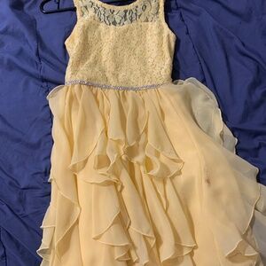 Yellow sparkly dress with ruffles